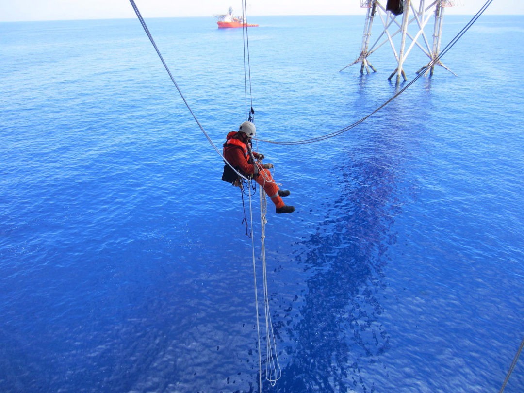 Africa Rope Access technician working at height